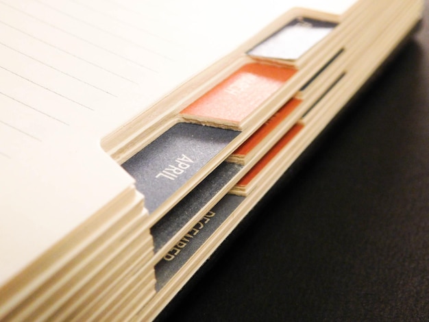 A close-up of a credit report document, highlighting key sections such as personal information, credit history, and credit score. The image is brightly lit and focused, emphasizing clarity and attention to detail when reviewing the report.