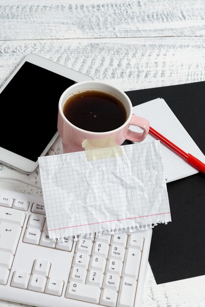 An image of a tax form (Form 8863) partially filled out, with a pen resting on it. The background is a clean workspace with a laptop and a cup of coffee. Focus on the form's details.