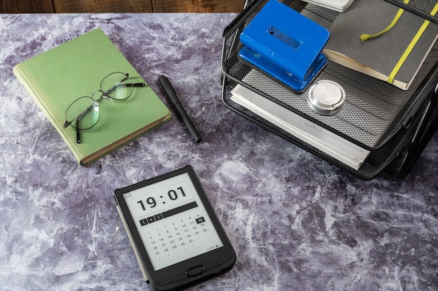 A close-up of Schedule R (Form 1040) being filled out with a pen. A calculator and reading glasses are nearby, conveying the careful attention needed to complete the form accurately.