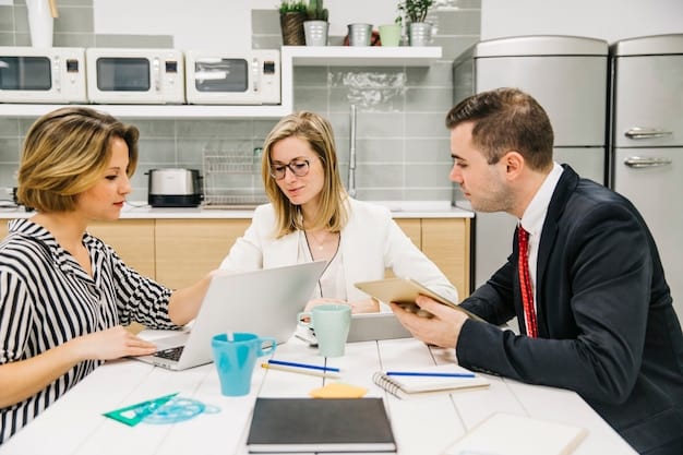 A well-organized office setting, with a tax professional reviewing documents and discussing strategies with a business owner. The image conveys a sense of trust and expertise, with a focus on detailed paperwork and financial consultations.