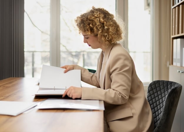 A person filling out a tax form at a desk, with a laptop and documents related to vehicle purchases and tax credits nearby. The scene highlights the importance of accurate documentation and proper filing procedures.