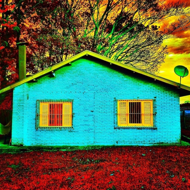 A split image showing a 'For Sale' sign in front of a large house on one side, and a smaller, cozy cottage on the other, representing the concept of downsizing. The colors are warm and inviting.