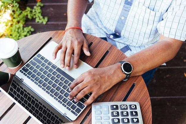 An individual using a laptop to navigate the IRS website, specifically the page with the EITC calculator tool. Focus on the digital tools available to taxpayers.